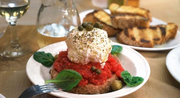 Two plates of traditional Greek meze