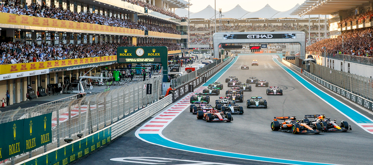 Image of formula one cars racing at Yas marina circuit in Abu Dhabi