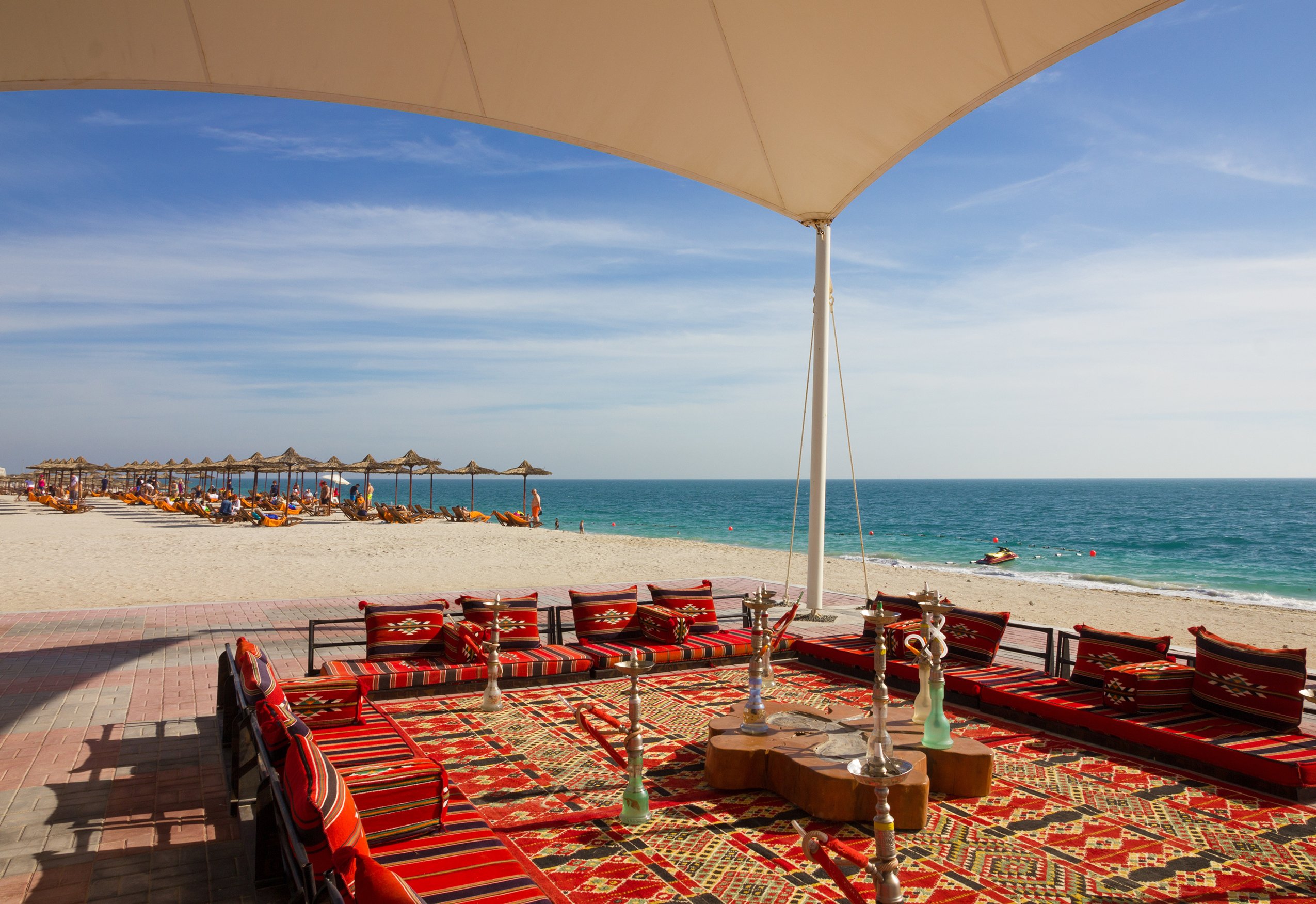 Abu Dhabi, UAE March 12, 2019: Beach on Sir Bani Yas island. Abu Dhabi Emirate. Hookah cafe