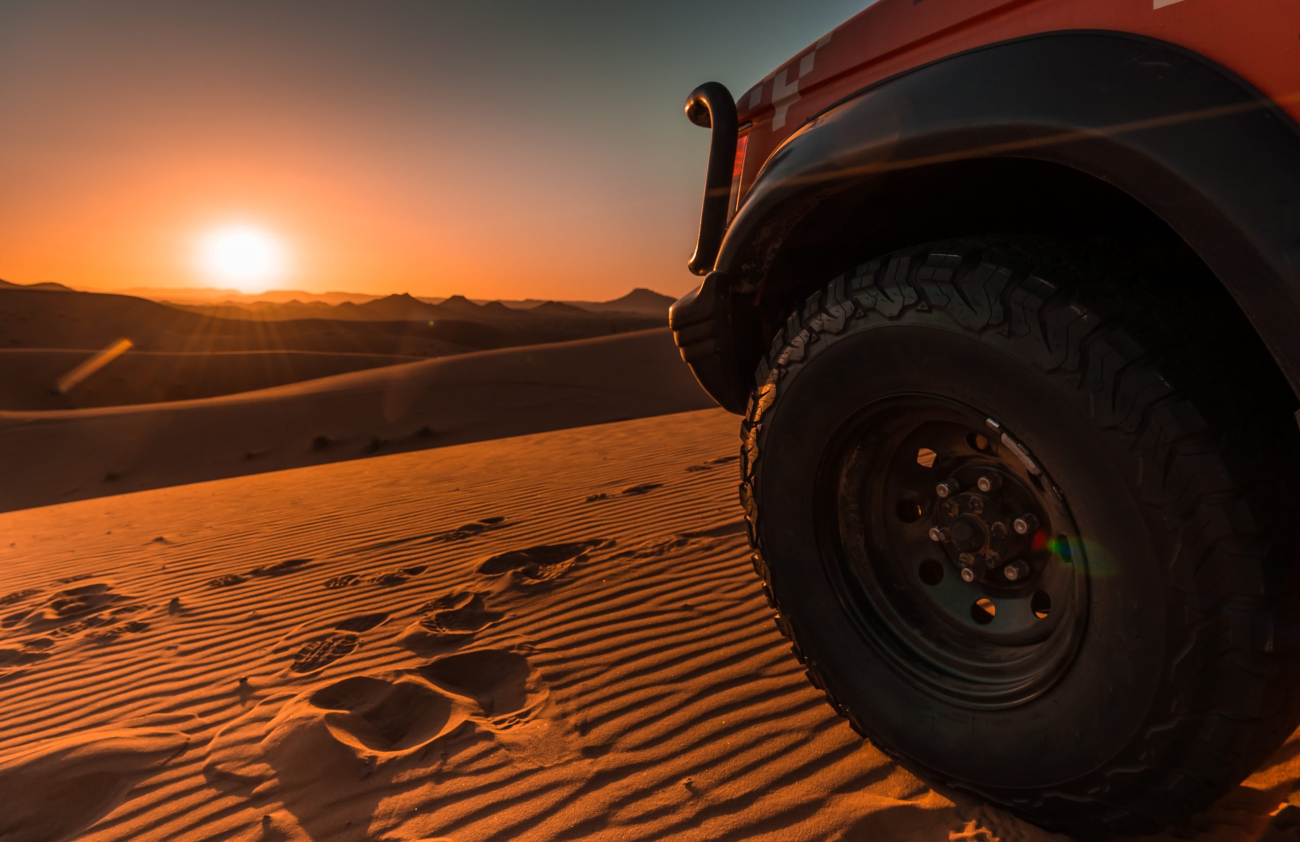4x4 vehicle, desert and sunset